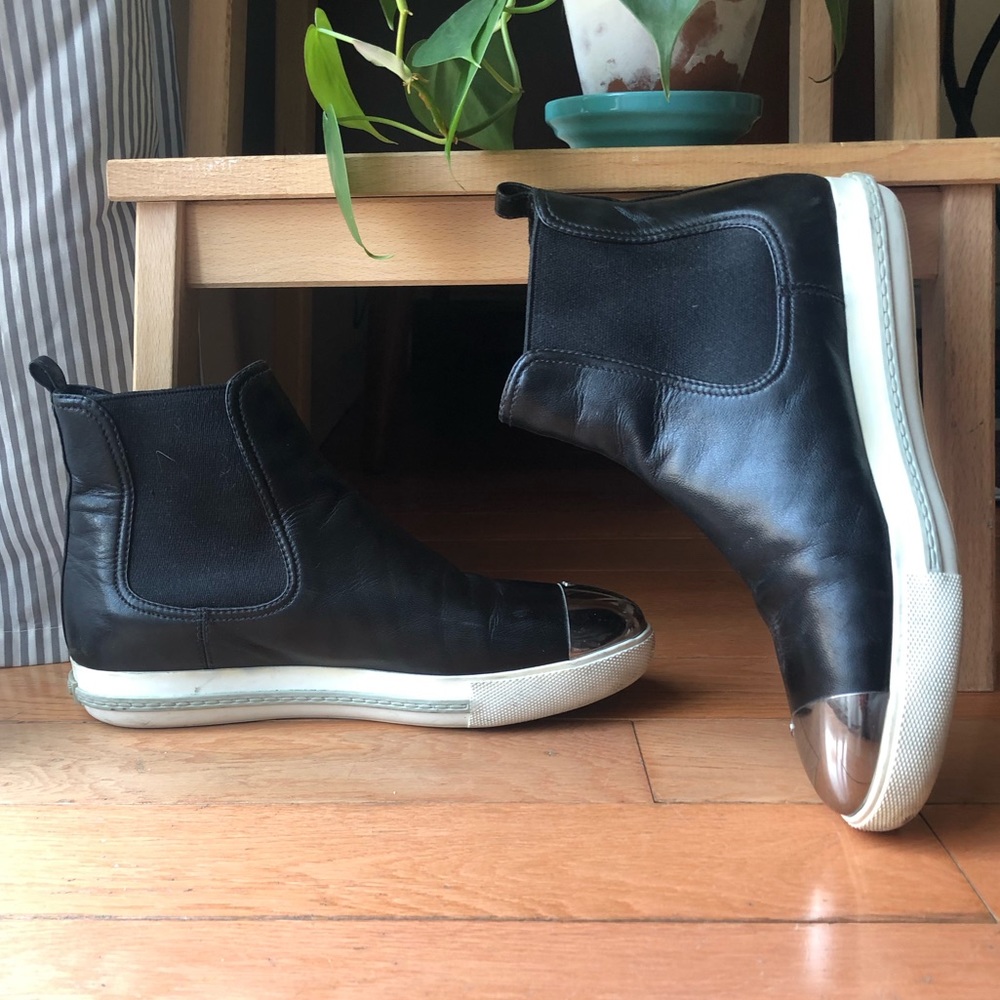 Miu Miu slip in nappa high top sneakers with metal